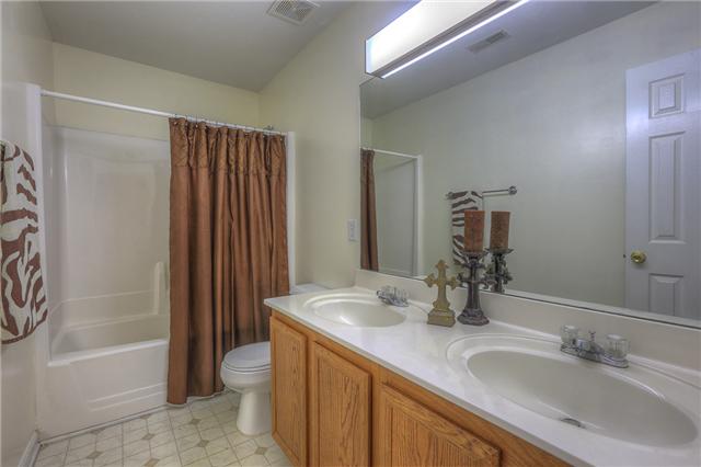 2148 Spring Hill Circle Spring Hill, TN 37174 - Photo 17 of 18 Full bath with shower/tub combination & double vanities.
