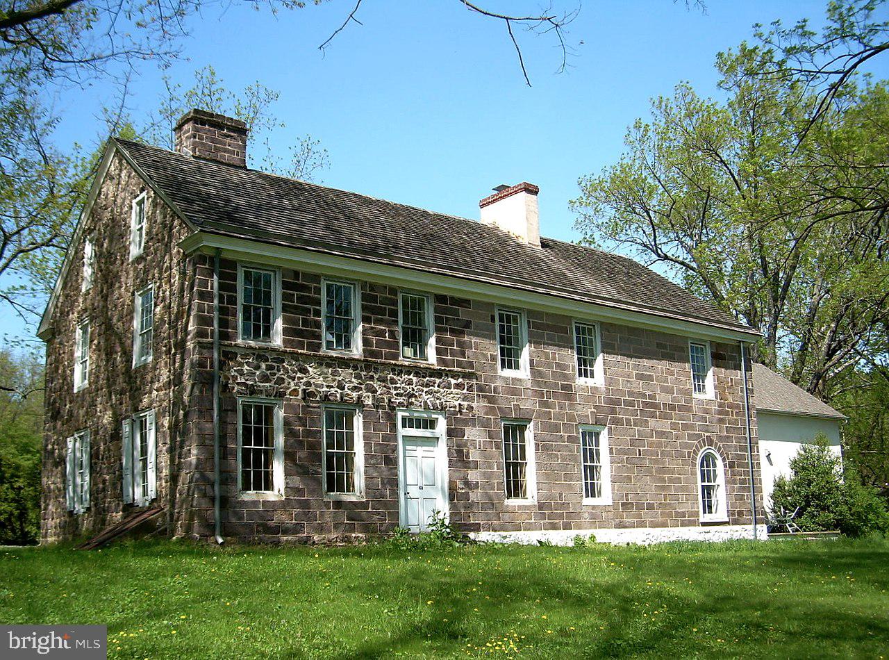 3381 Coventryville Road Pottstown, PA 19465 - Photo 2 of 4 front view of a house with a yard