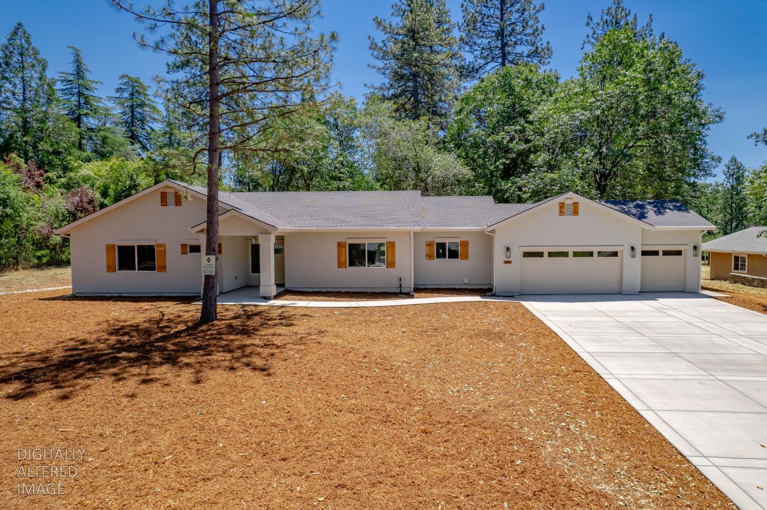 280 Jan Road Grass Valley, CA 95945 - Photo 63 of 66 a front view of a house with a yard
