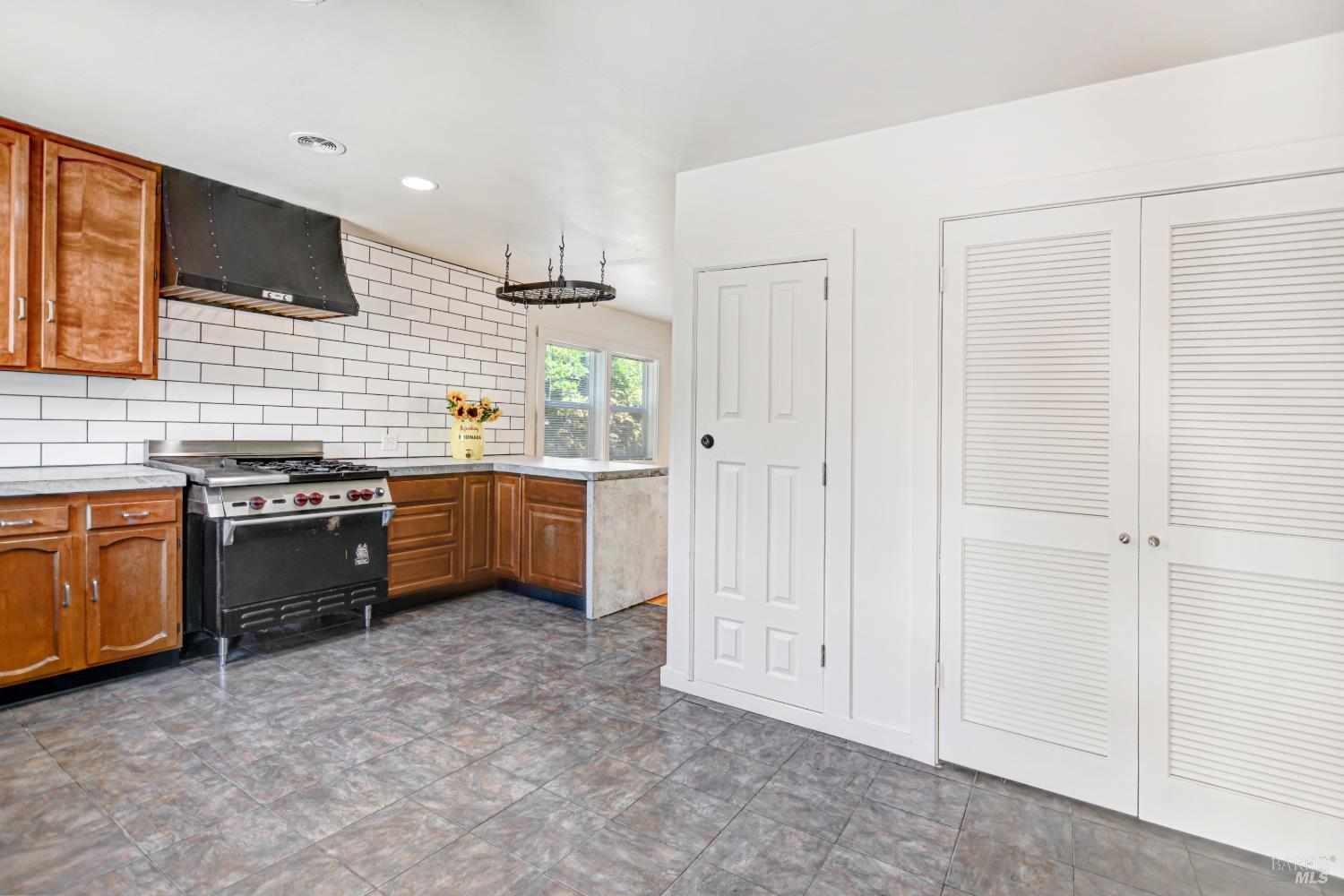 866 Yuba Drive Santa Rosa, CA 95407 - Photo 11 of 73 KITCHEN-WASHER/DRYER SPACE INSIDE LOUVERED DOORS