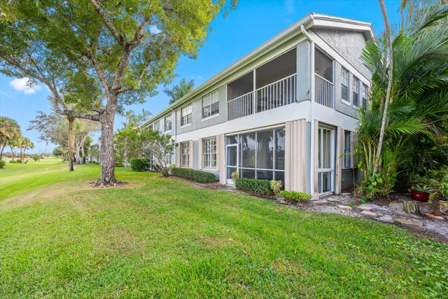 a view of a park with palm trees