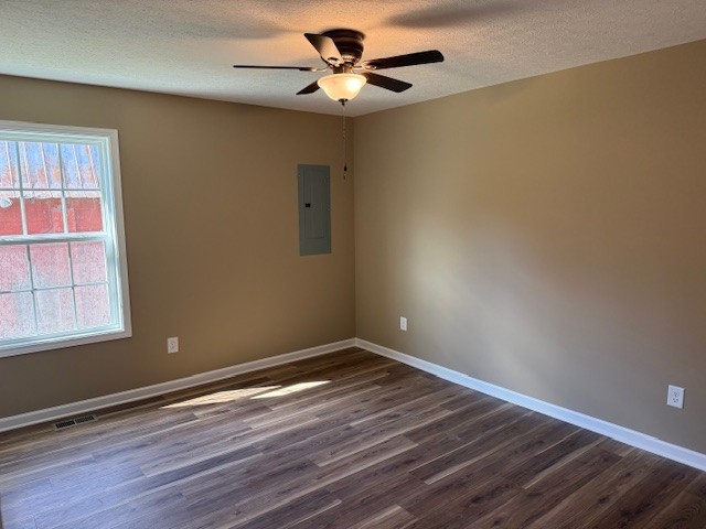 206 Hotel Street Decherd, TN 37324 - Photo 16 of 28 a view of empty room with wooden floor and fan
