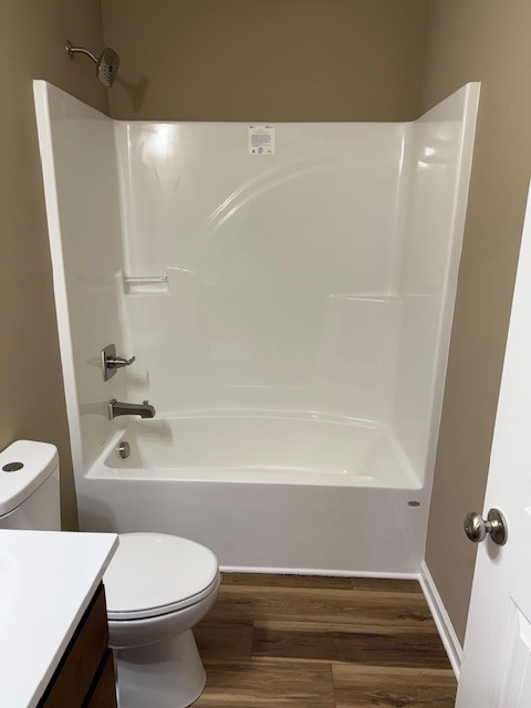 206 Hotel Street Decherd, TN 37324 - Photo 18 of 28 a bathroom with a toilet and a shower