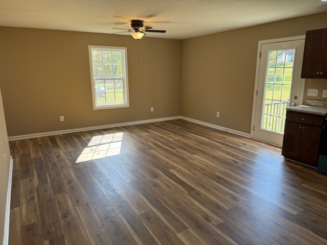 206 Hotel Street Decherd, TN 37324 - Photo 21 of 28 wooden floor in an empty room with a window