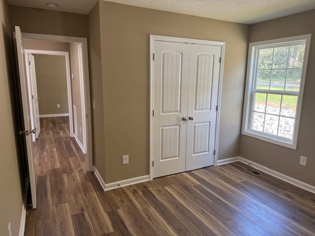 206 Hotel Street Decherd, TN 37324 - Photo 23 of 28 a view of a room with wooden floor and window