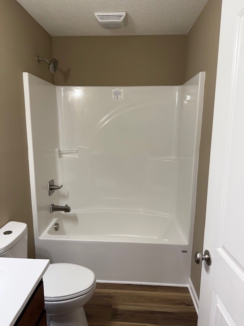 206 Hotel Street Decherd, TN 37324 - Photo 25 of 28 a bathroom with a bathtub and a toilet