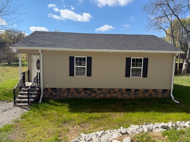 206 Hotel Street Decherd, TN 37324 - Photo 28 of 28 a front view of a house with a yard