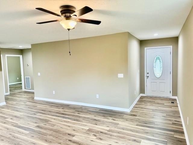 206 Hotel Street Decherd, TN 37324 - Photo 4 of 28 a view of a livingroom with wooden floor