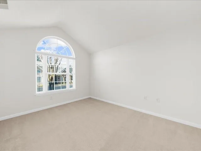 a picture of a bathroom with a shower