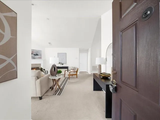 a room with gym equipment and a window