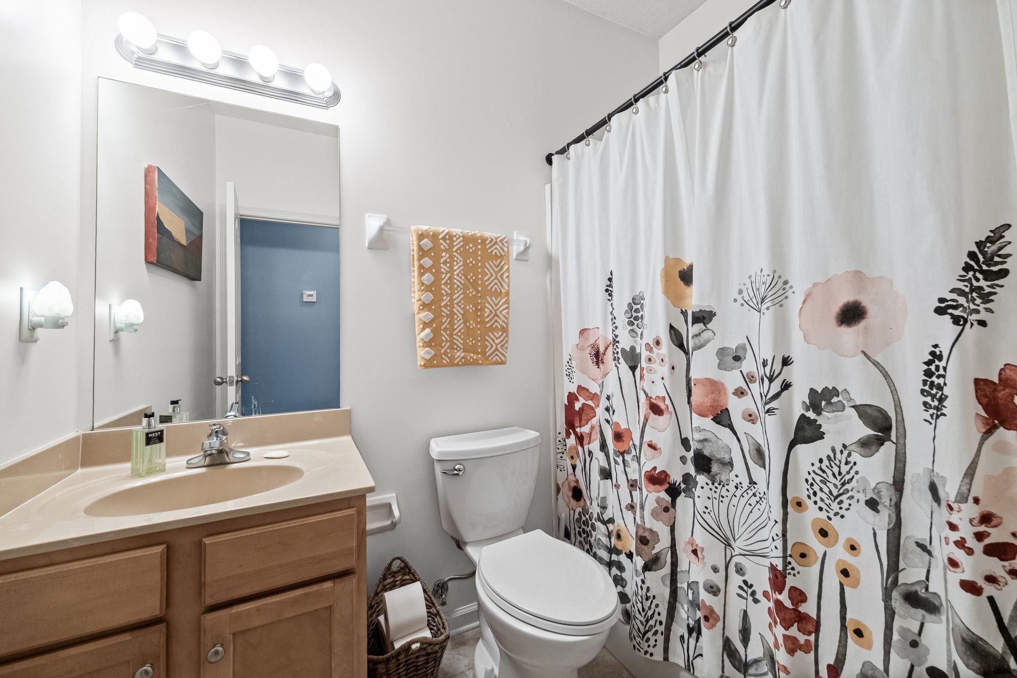 4950 Shaws Ridge Trail Arlington, TN 38002 - Photo 13 of 27 a bathroom with a sink toilet and shower
