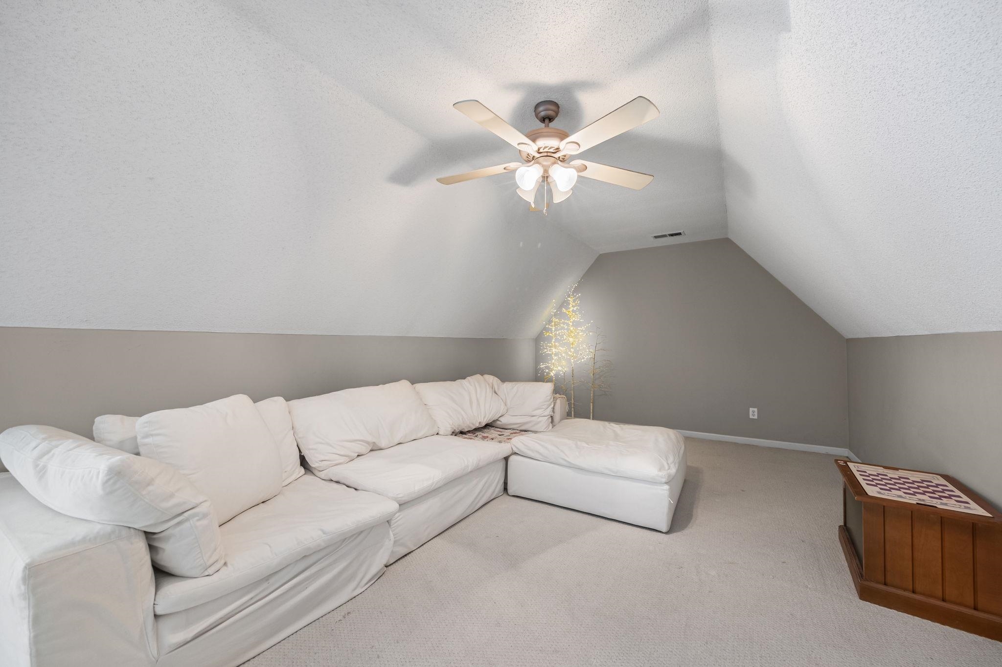 4950 Shaws Ridge Trail Arlington, TN 38002 - Photo 20 of 27 a living room with furniture and a ceiling fan