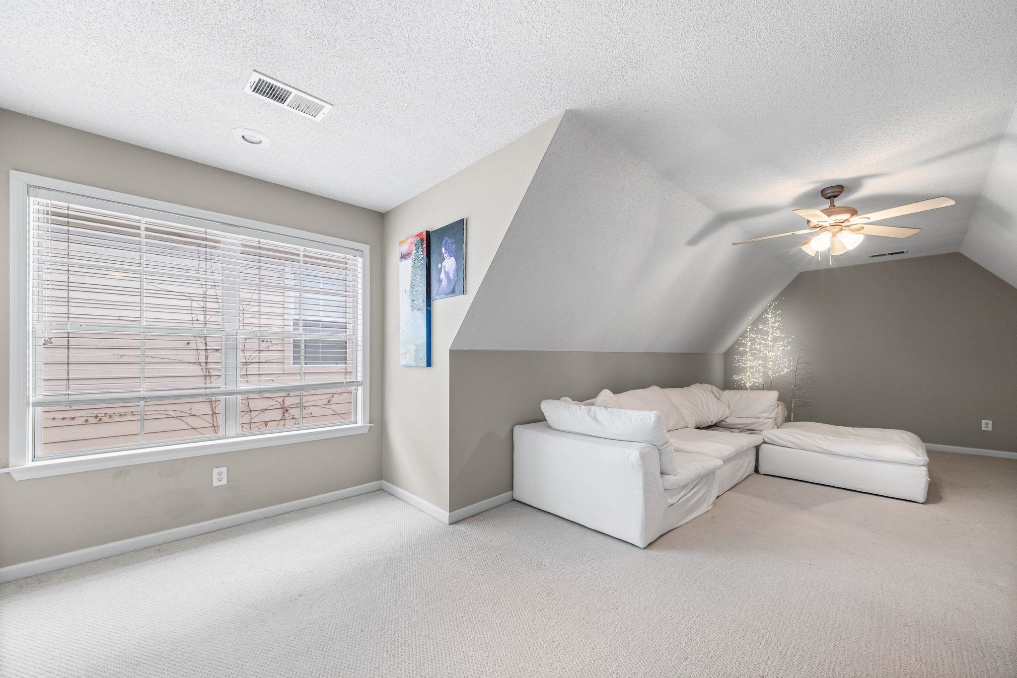 4950 Shaws Ridge Trail Arlington, TN 38002 - Photo 21 of 27 a living room with furniture and a large window