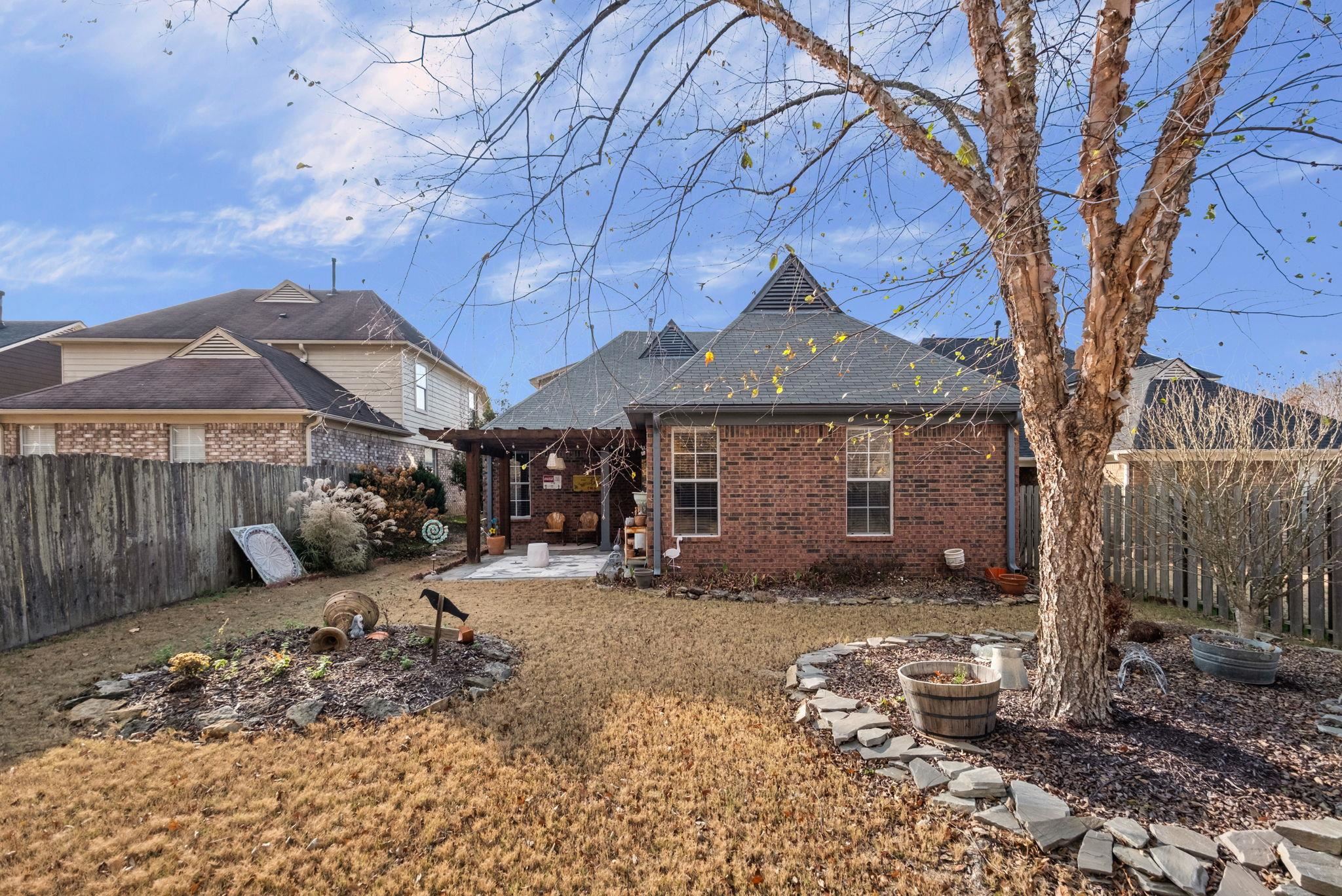 4950 Shaws Ridge Trail Arlington, TN 38002 - Photo 25 of 27 a front view of a house with a yard