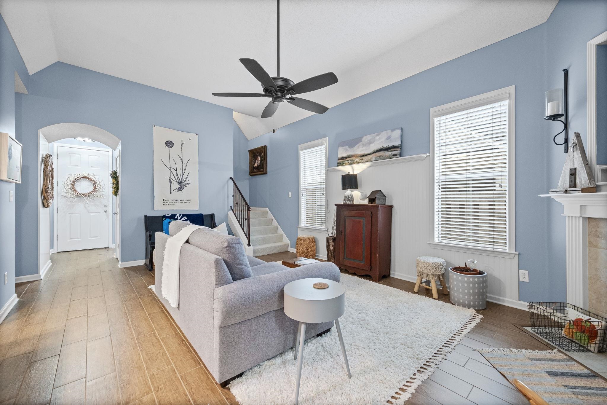 4950 Shaws Ridge Trail Arlington, TN 38002 - Photo 8 of 27 a living room with furniture a window and a chandelier