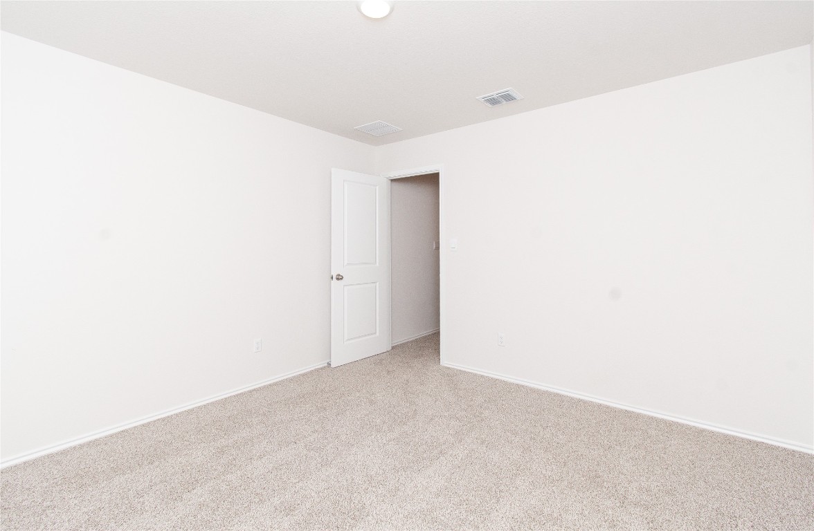 201 Varner Way Lockhart, TX 78644 - Photo 7 of 16 Unfurnished room with carpet and baseboards