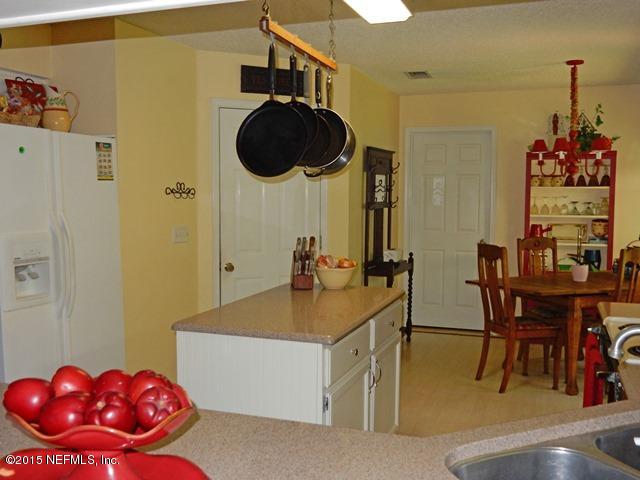 12332 Field Bluff Road Jacksonville, FL 32223 - Photo 12 of 32 KITCHEN TO BREAKFAST
