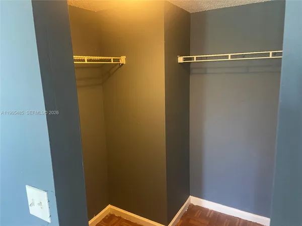 a bathroom with a shower and a toilet