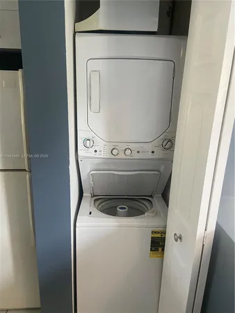 a balcony view with a yard