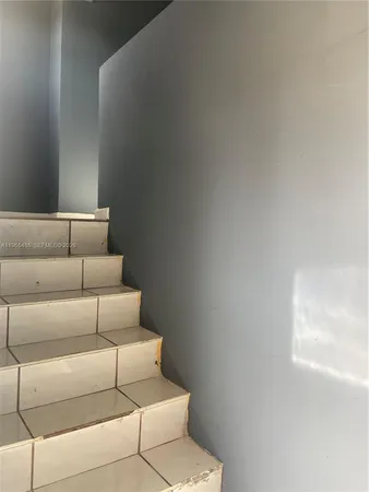 a view of entryway with couches