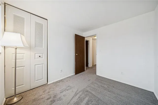 an empty room with closet