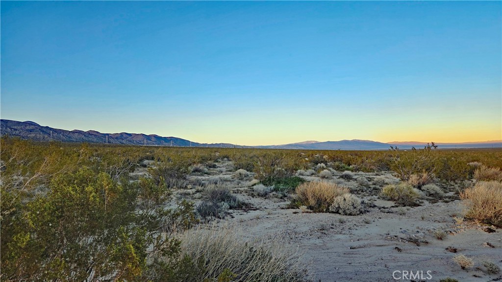 0 Rose Avenue Mojave, CA 93501 - Photo 15 of 23 a view of a lake with mountains in the background