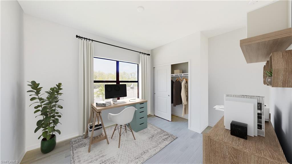 3114 Juniper Way Naples, FL 34112 - Photo 20 of 28 a workspace with furniture and a potted plant