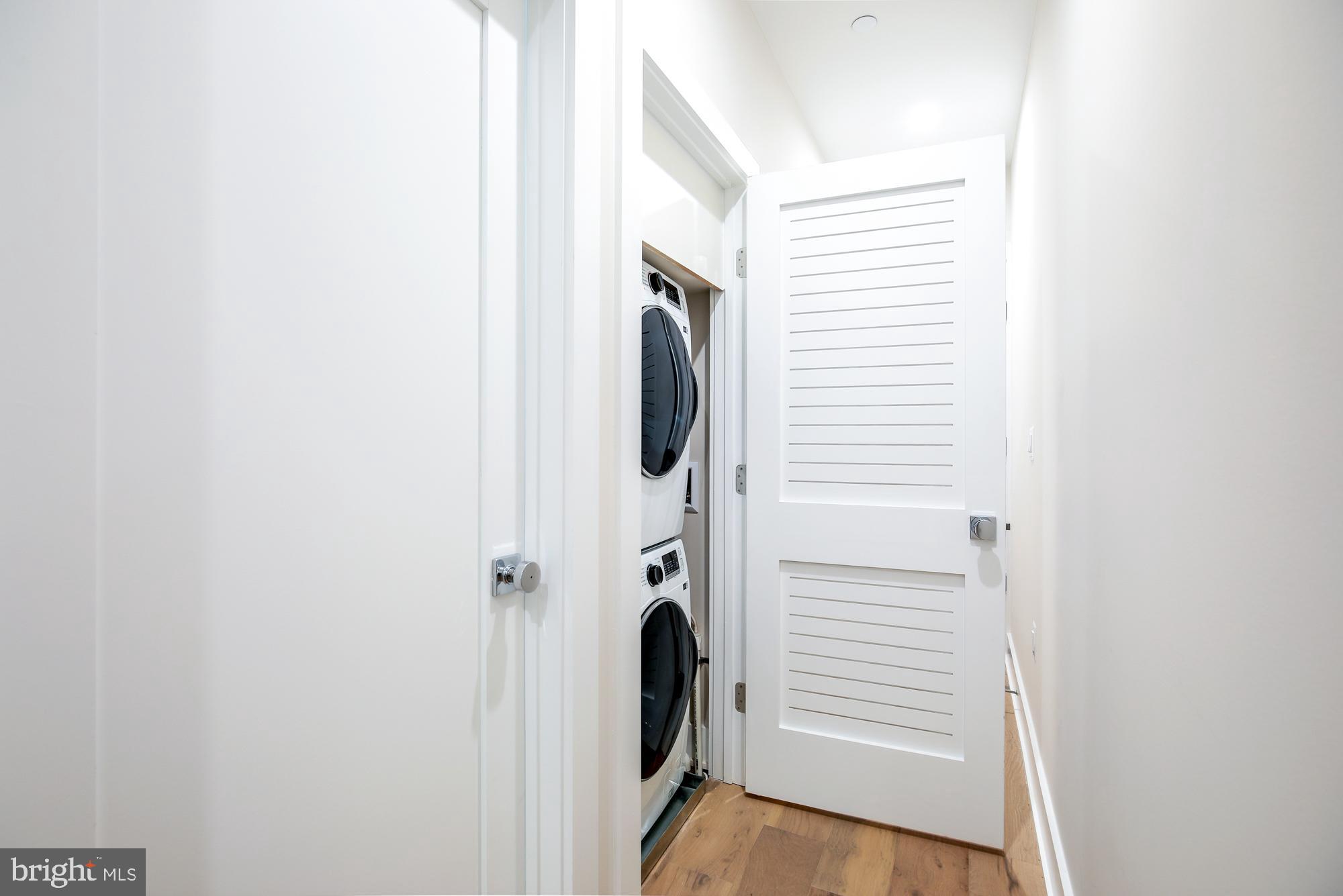 1421 Spring Road Northwest, Unit IZ204 Washington, DC 20010 - Photo 10 of 12 a view of a storage & utility room in a utility room