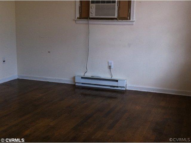 15700 Saddlebrook Road Chesterfield, VA 23838 - Photo 2 of 6 a view of a room with wooden floor and a window