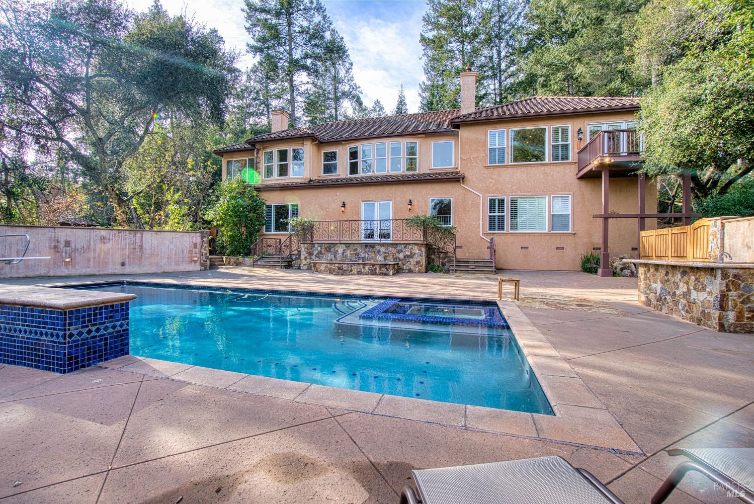 2703 Brush Creek Road Santa Rosa, CA 95404 - Photo 1 of 78 a swimming pool view with a seating space and a garden view