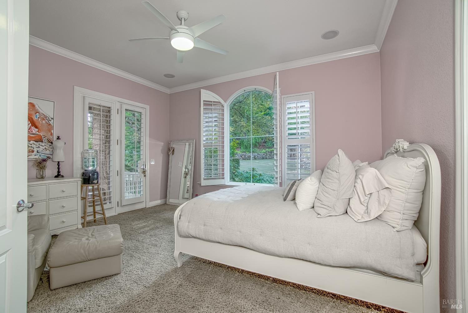 2703 Brush Creek Road Santa Rosa, CA 95404 - Photo 22 of 78 a bedroom with a large bed and a large window
