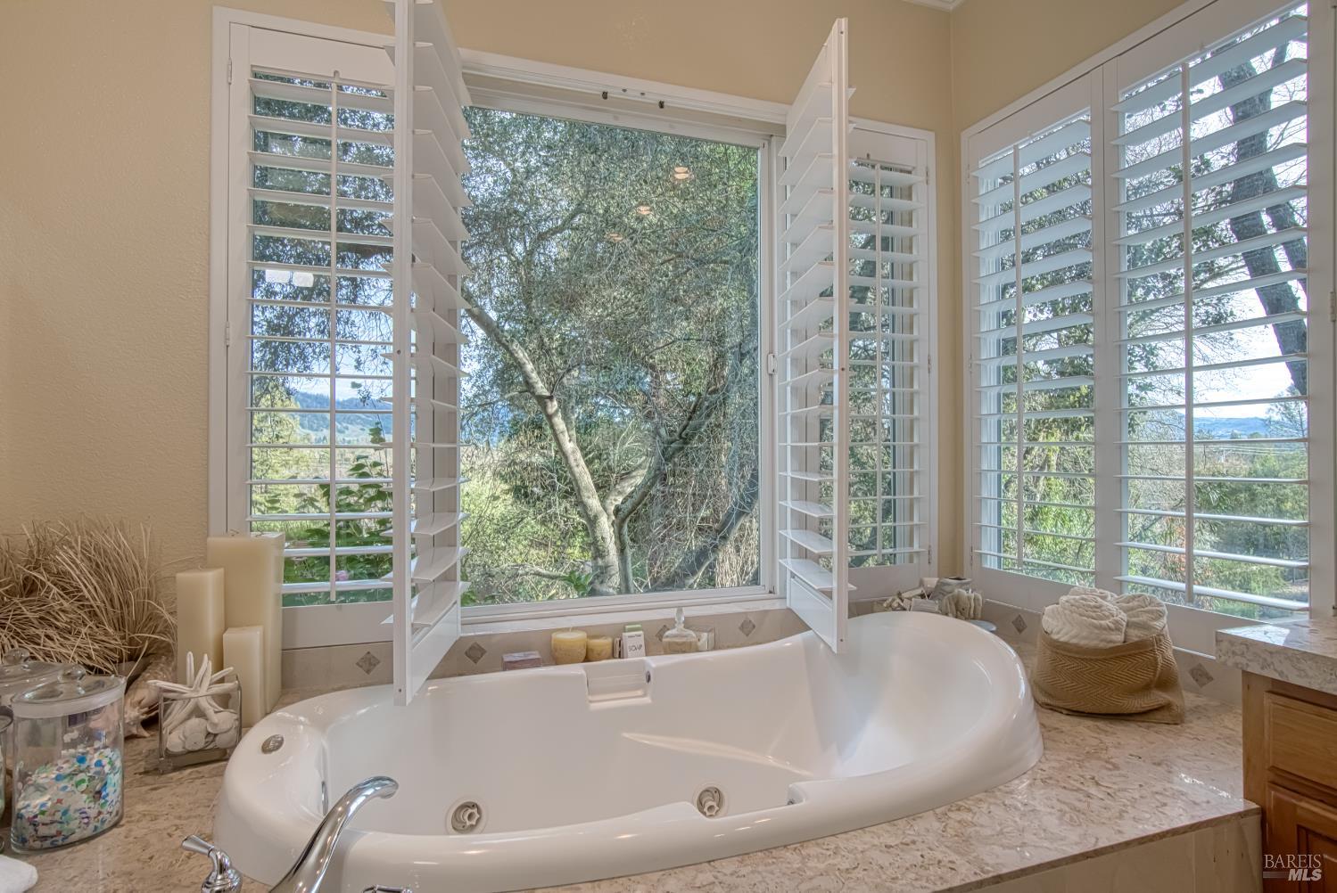 2703 Brush Creek Road Santa Rosa, CA 95404 - Photo 28 of 78 a bath tub sitting in a bathroom next to a window