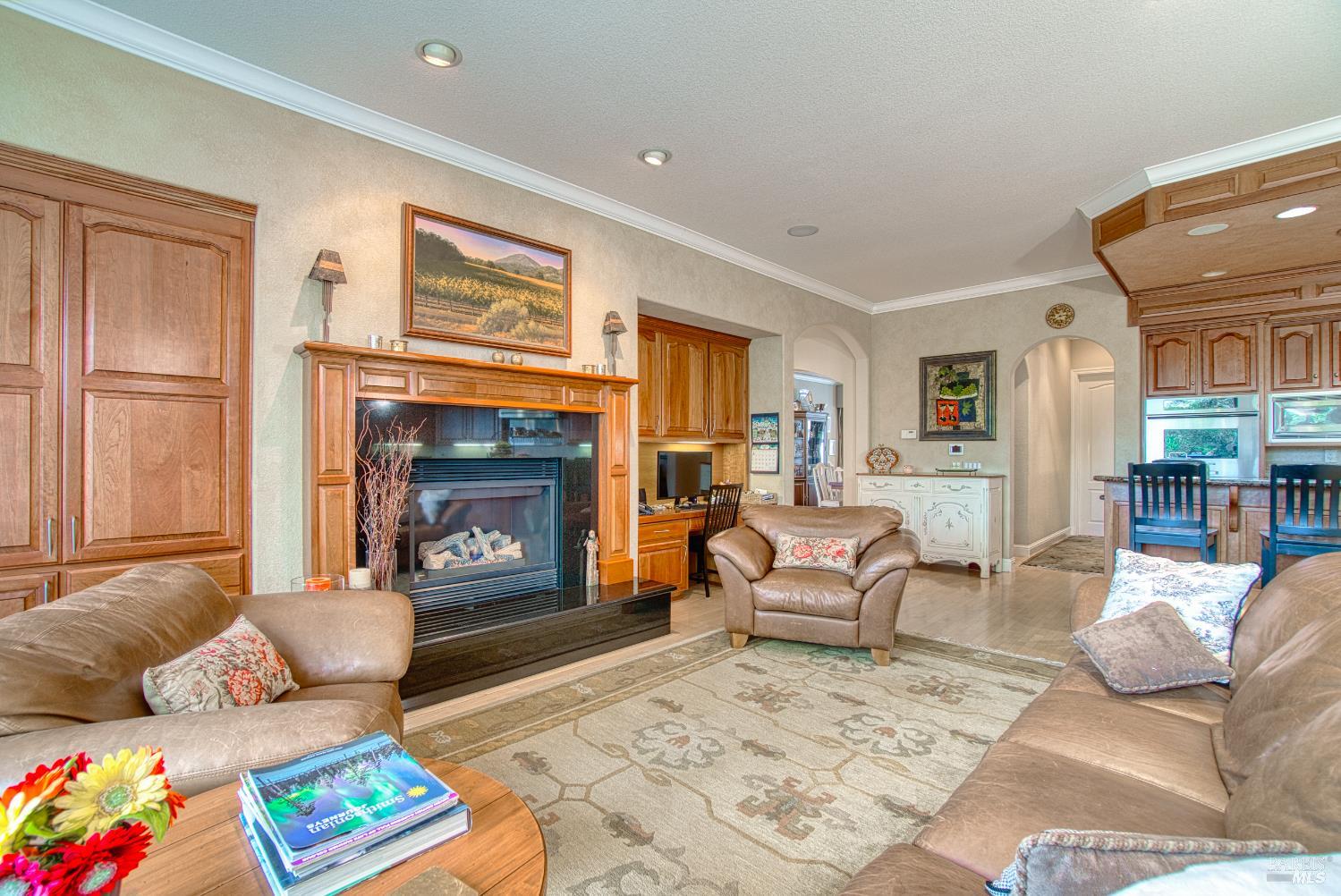 2703 Brush Creek Road Santa Rosa, CA 95404 - Photo 32 of 78 a living room with furniture and a fireplace