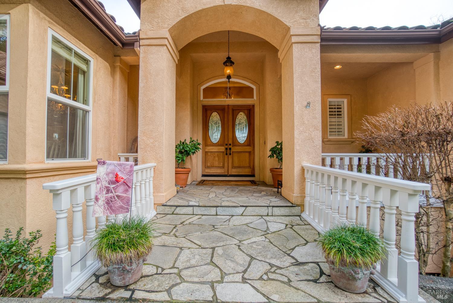2703 Brush Creek Road Santa Rosa, CA 95404 - Photo 5 of 78 a front view of a house with a porch