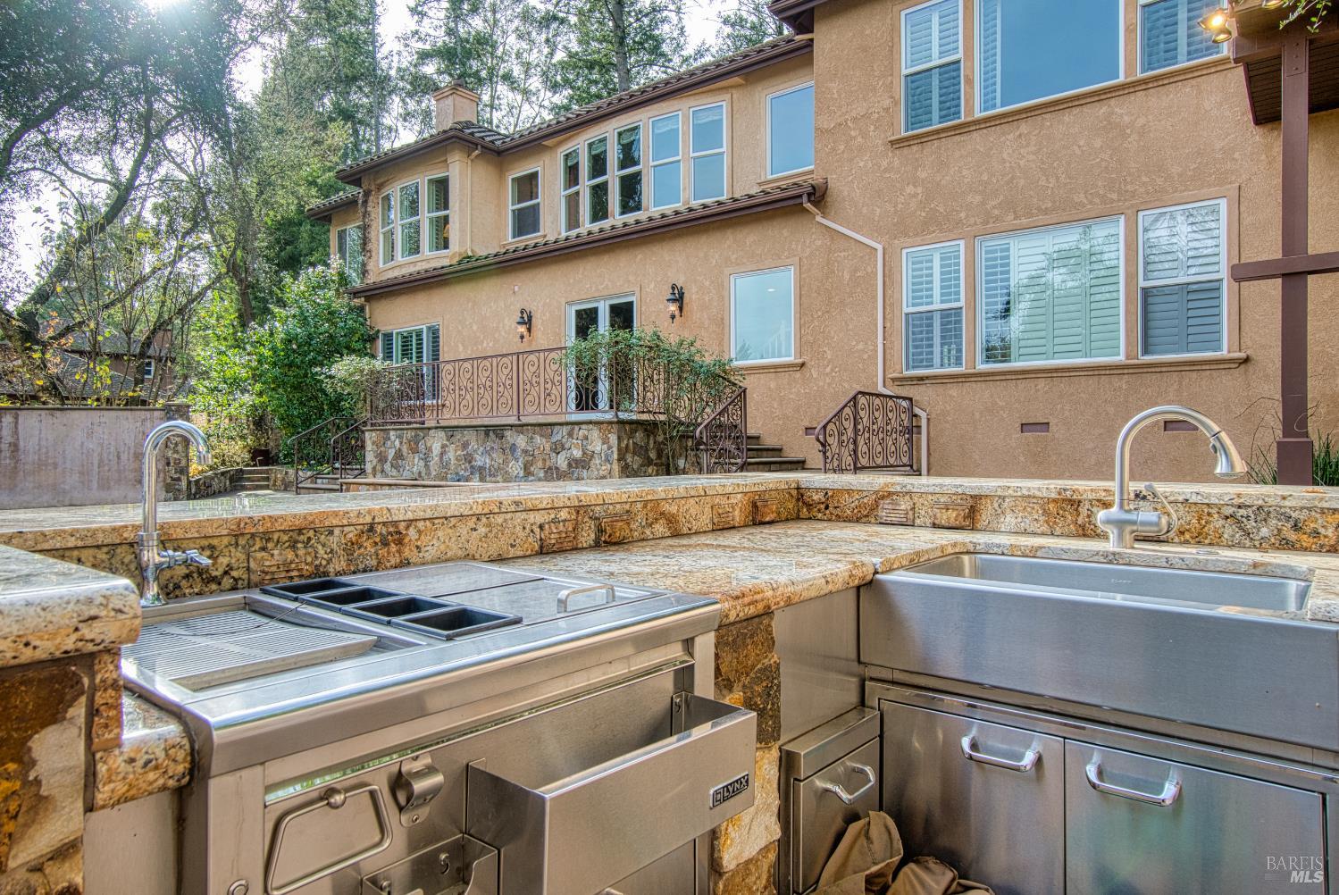 2703 Brush Creek Road Santa Rosa, CA 95404 - Photo 68 of 78 a view of a kitchen with a sink and a stove top oven