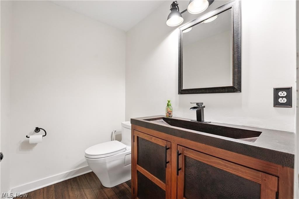 263 East Pine Lake Road North Lima, OH 44452 - Photo 24 of 50 Bathroom featuring vanity and dark wood finished floors
