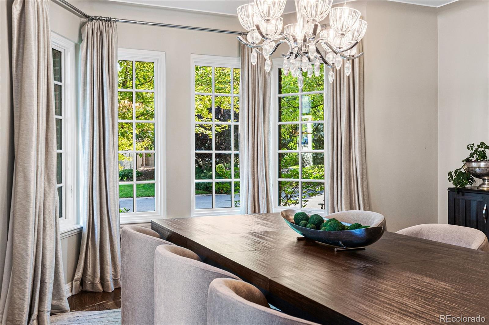 28 Crestmoor Drive Denver, CO 80220 - Photo 13 of 45 a view of a wooden floor and a window in a room