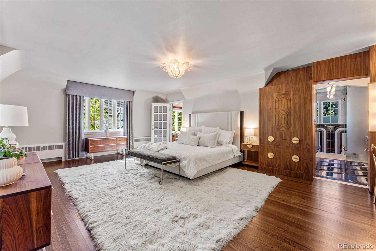 28 Crestmoor Drive Denver, CO 80220 - Photo 24 of 45 a living room with furniture and wooden floor
