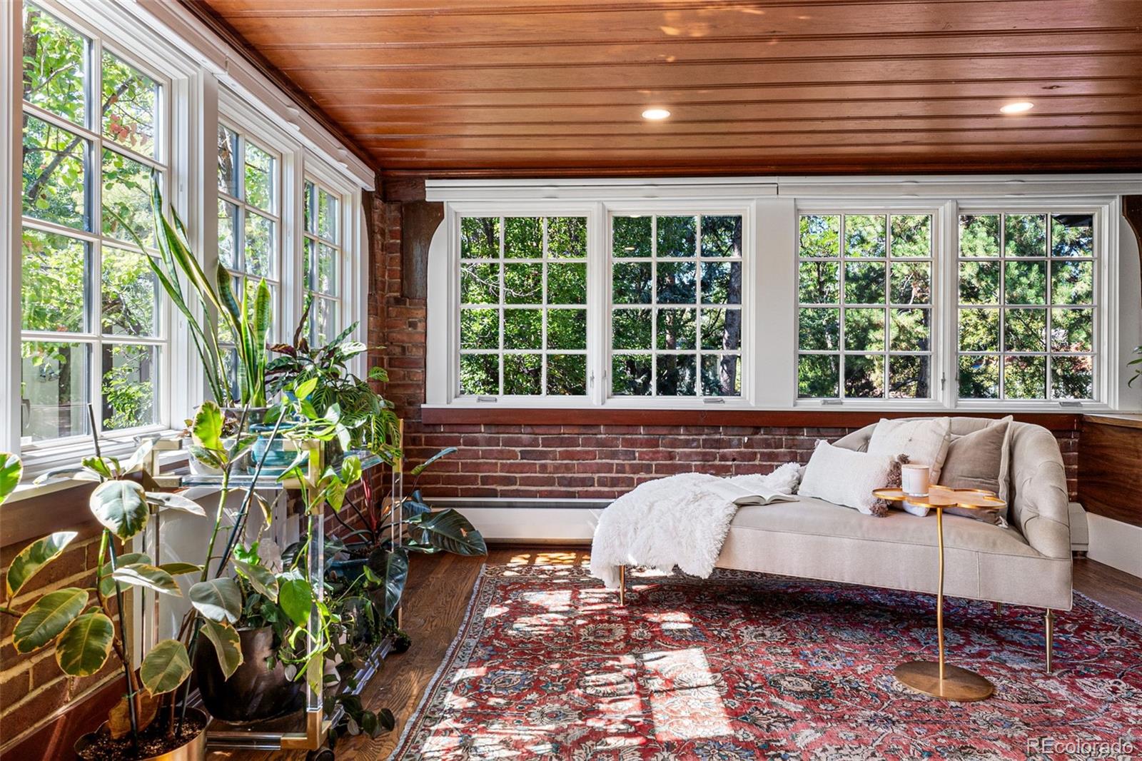 28 Crestmoor Drive Denver, CO 80220 - Photo 29 of 45 a balcony with furniture and a potted plant