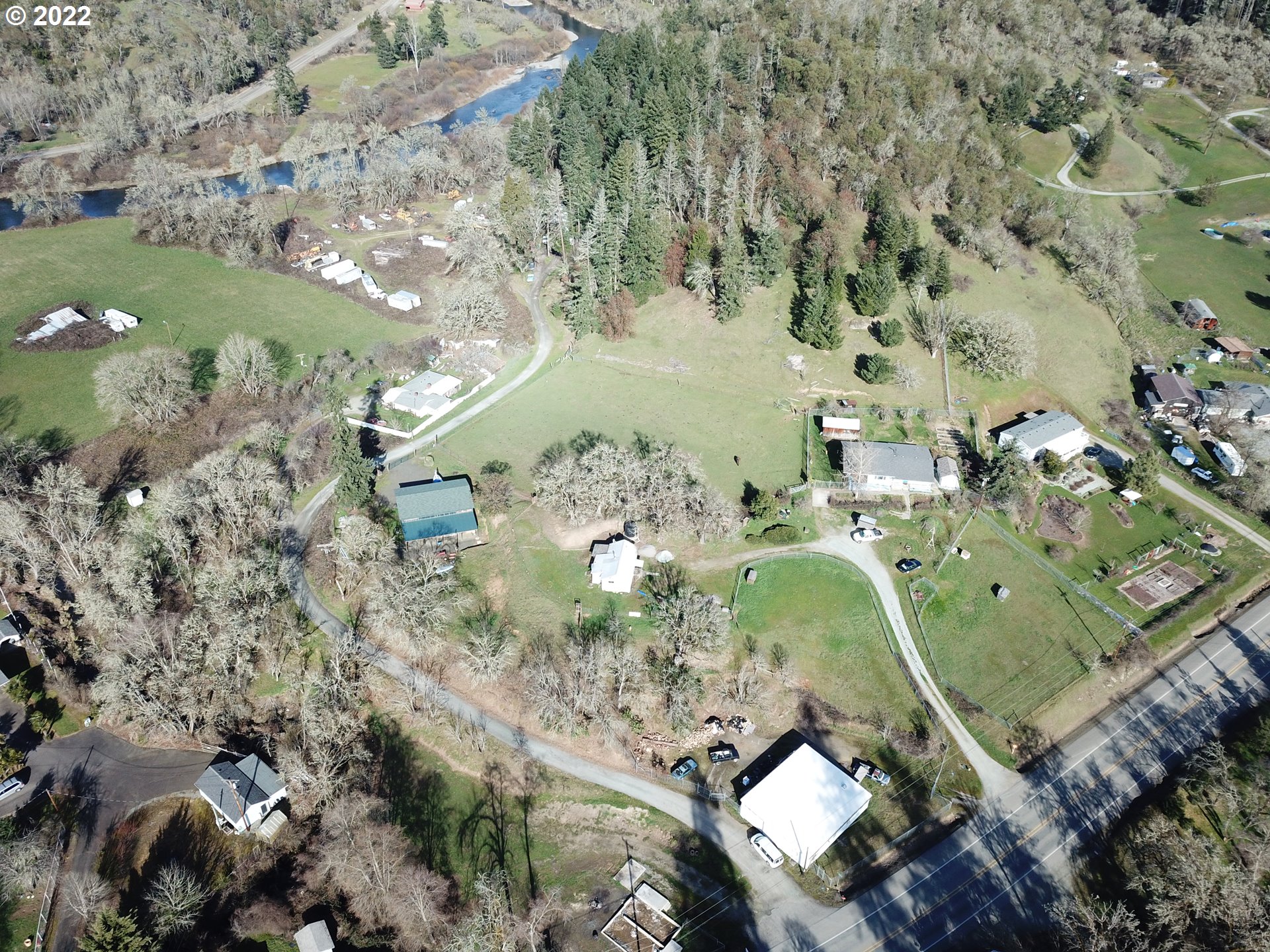 3637 Canyonville-Riddle Road Riddle, OR 97469 - Photo 28 of 29 an aerial view of a house with a yard