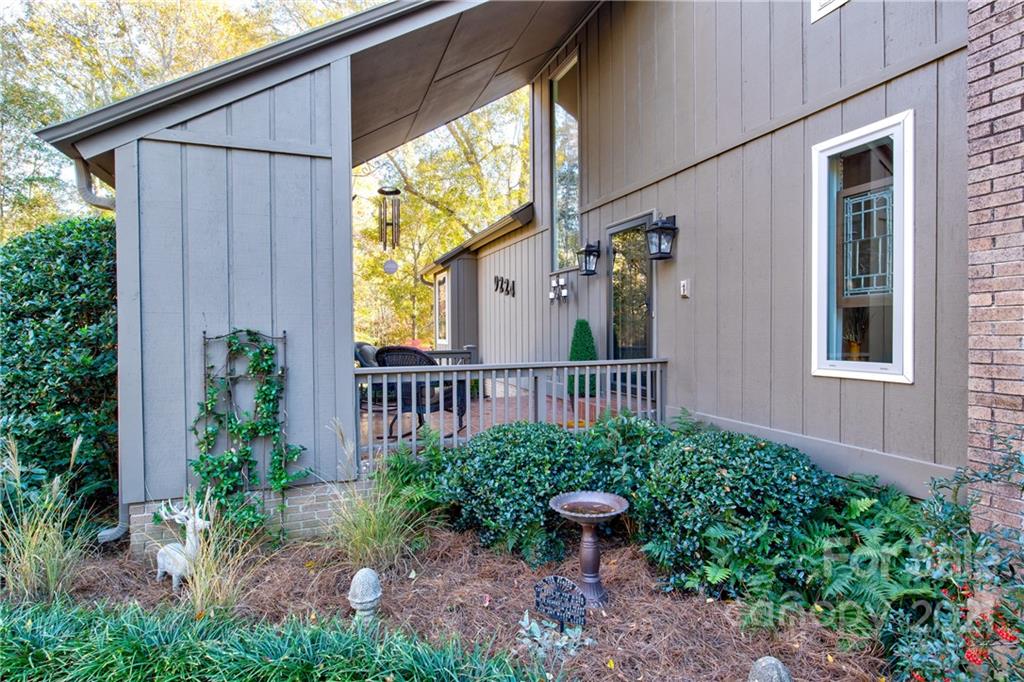 9224 State Rd S-29-624 Indian Land, SC 29707 - Photo 2 of 48 a view of a backyard with plants