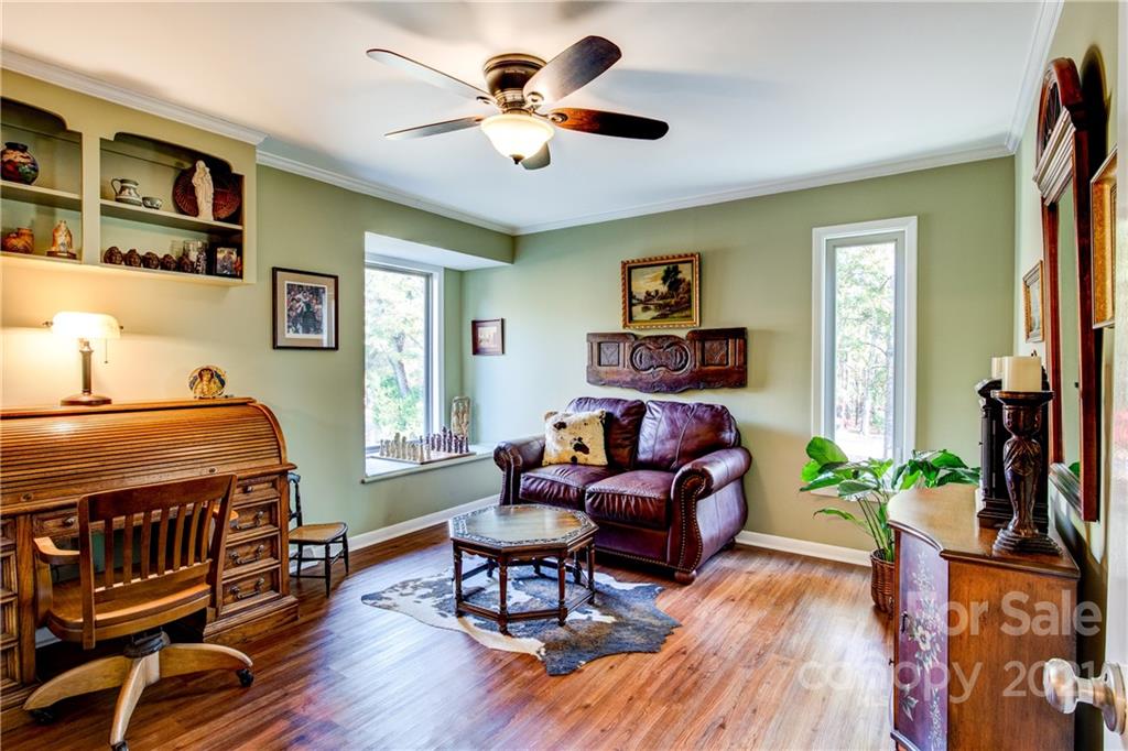 9224 State Rd S-29-624 Indian Land, SC 29707 - Photo 19 of 48 a living room with furniture and a flat screen tv