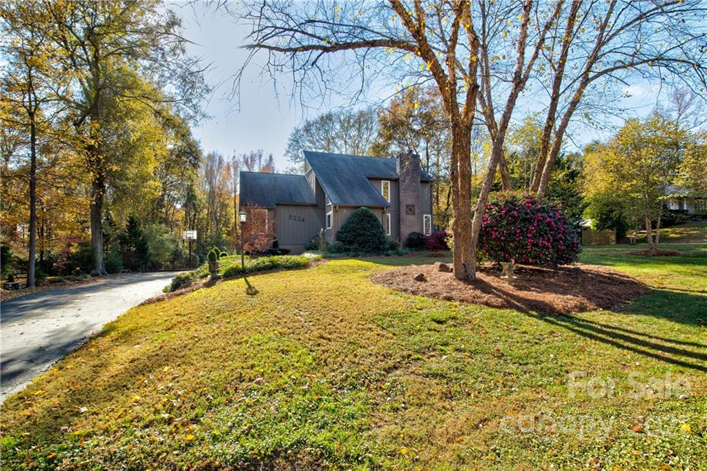 9224 State Rd S-29-624 Indian Land, SC 29707 - Photo 3 of 48 a view of a house with a yard