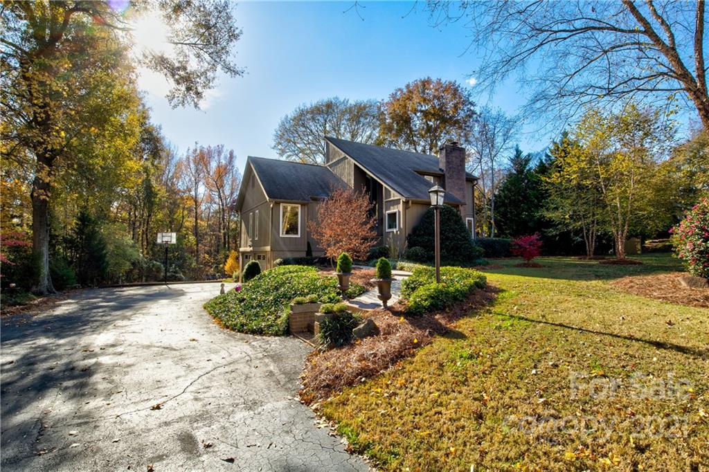9224 State Rd S-29-624 Indian Land, SC 29707 - Photo 4 of 48 a backyard of a house with lots of green space