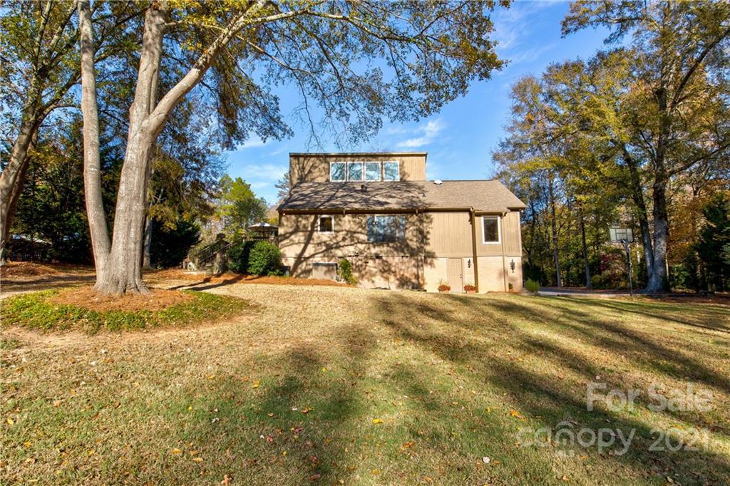 9224 State Rd S-29-624 Indian Land, SC 29707 - Photo 34 of 48 a front view of a house with a yard and garage