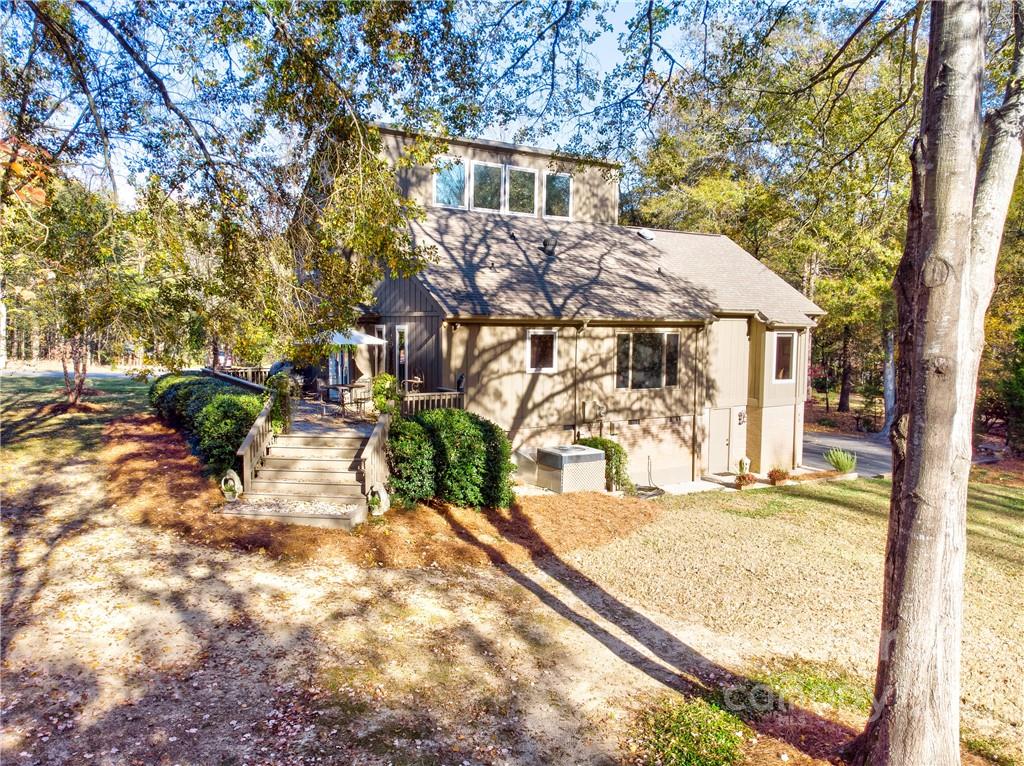 9224 State Rd S-29-624 Indian Land, SC 29707 - Photo 36 of 48 a view of a house with a yard covered in snow