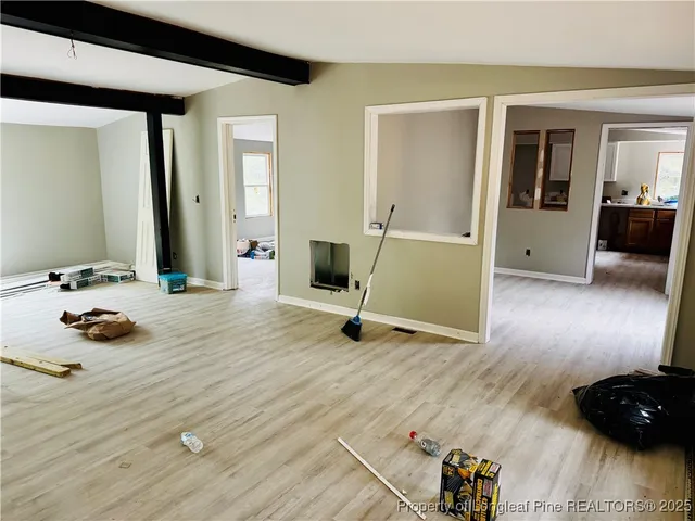 a room with gym equipment and equipment