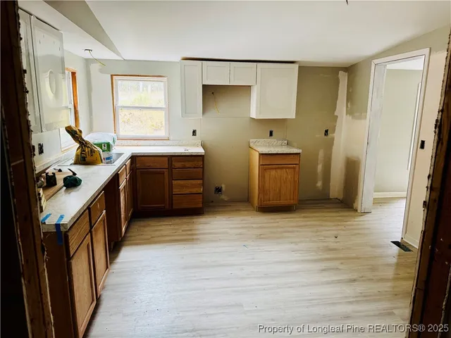 a bathroom with a sink and a washing machine