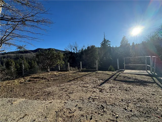 a view of a backyard of a house