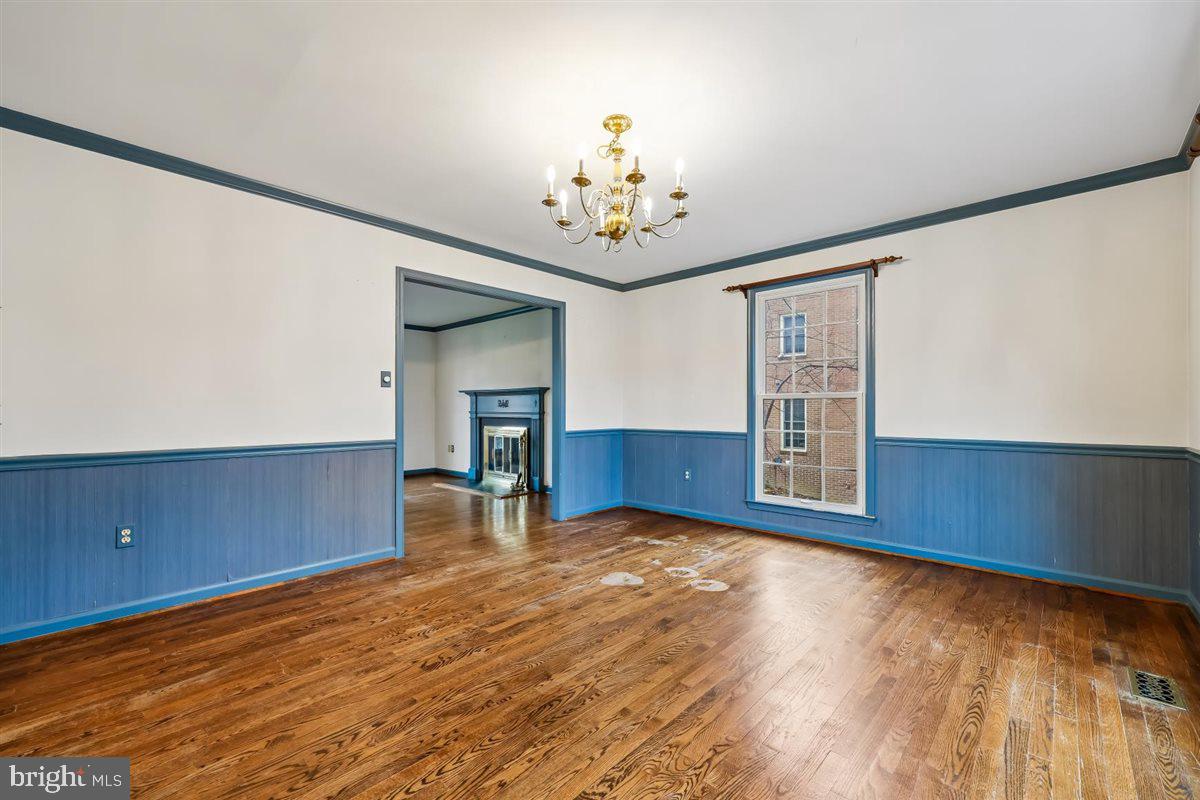 13724 Bridgewater Drive Silver Spring, MD 20904 - Photo 21 of 99 a view of an empty room with window and wooden floor
